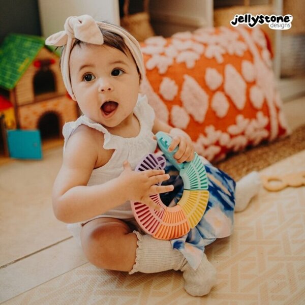 Pierwsze puzzle sensoryczne dla niemowlaka kółko Jellystone Design pastelowe